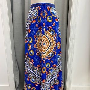 This bright maxi skirt is so fun! Great material and elastic waistband!
